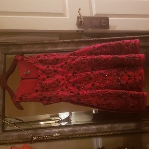 Red Dress by Taylor with black sequin flowers. Size 8